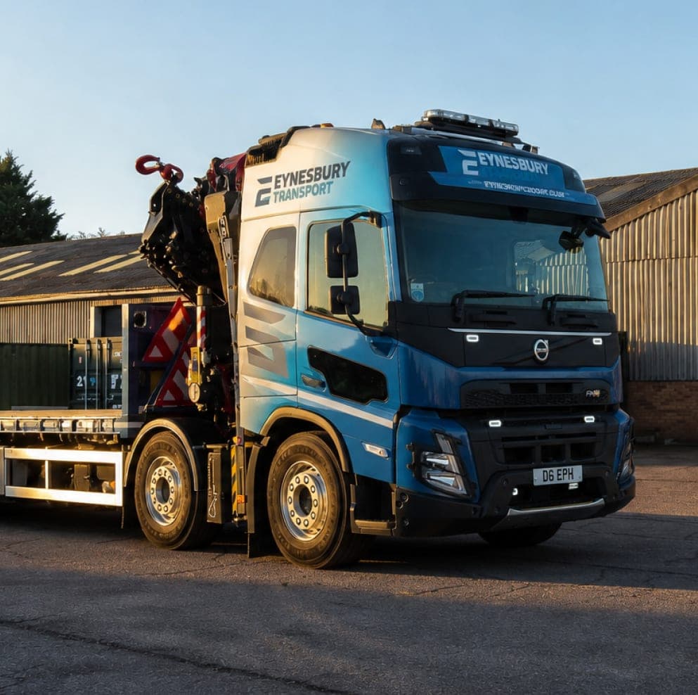 An Eynesbury crane lorry outside the storage barn