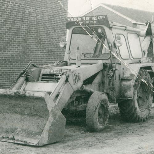 An Eynesbury Plant Hire backhoe loader in the 1960s