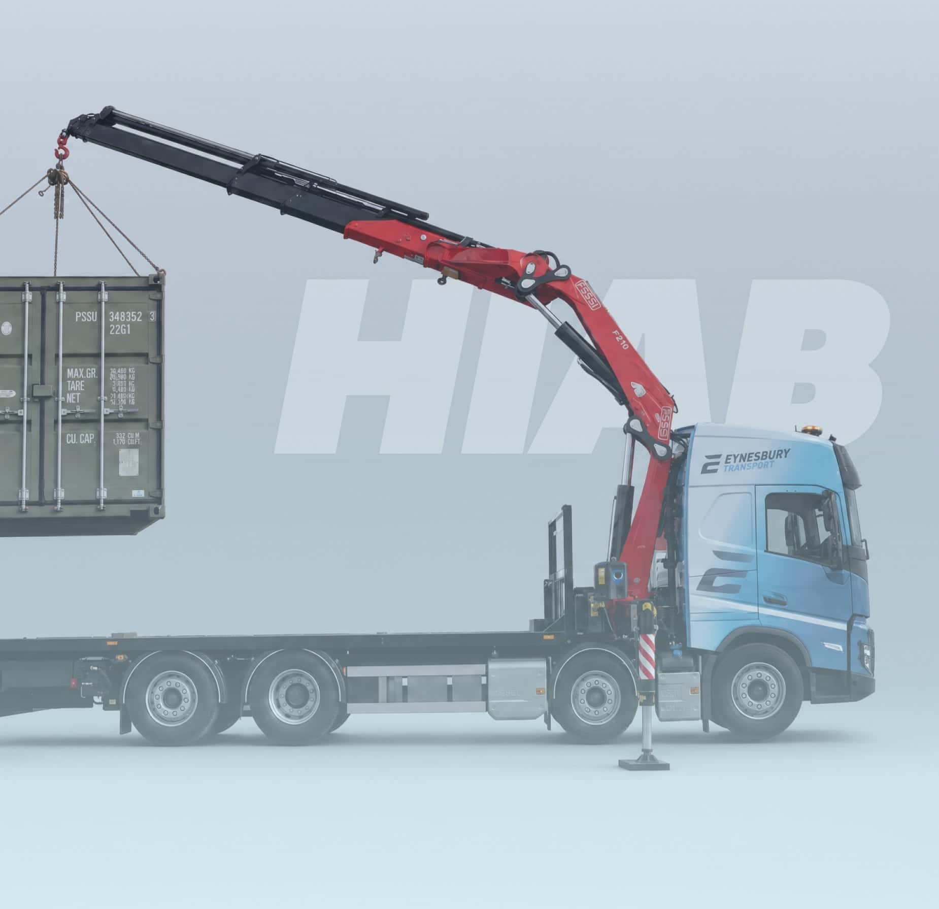 An Eynesbury Hiab lorry lifting a container